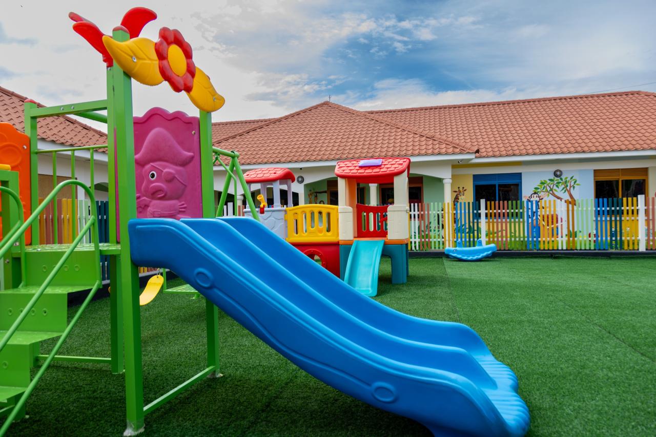 Slides and climbing frames in the Little Explorers play garden