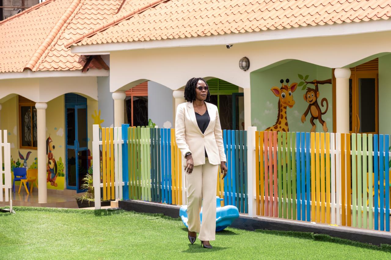 Walking past the rainbow fence and animal murals outside the Little Explorers classrooms
