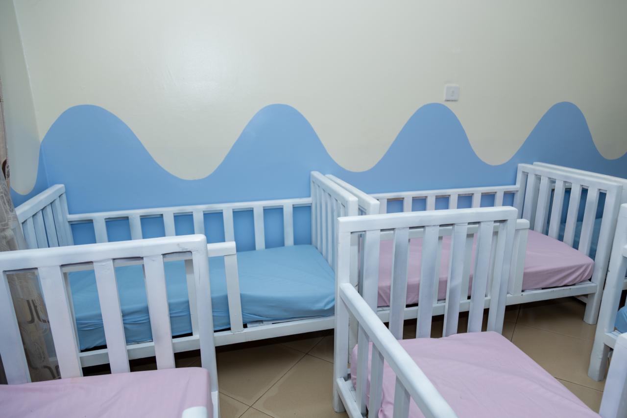 The quiet rest room with its row of white cots