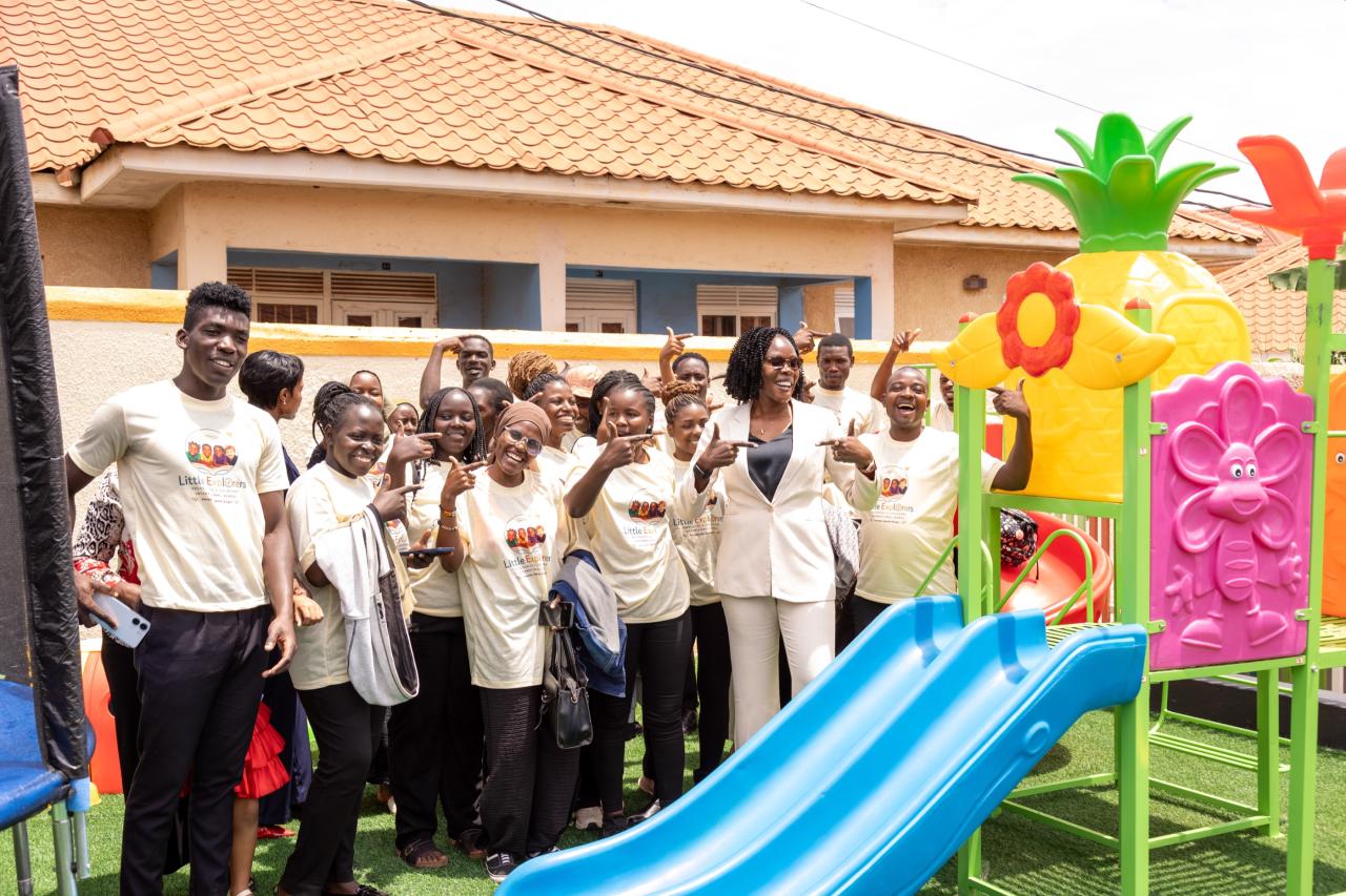 The Little Explorers team cheering in the play garden